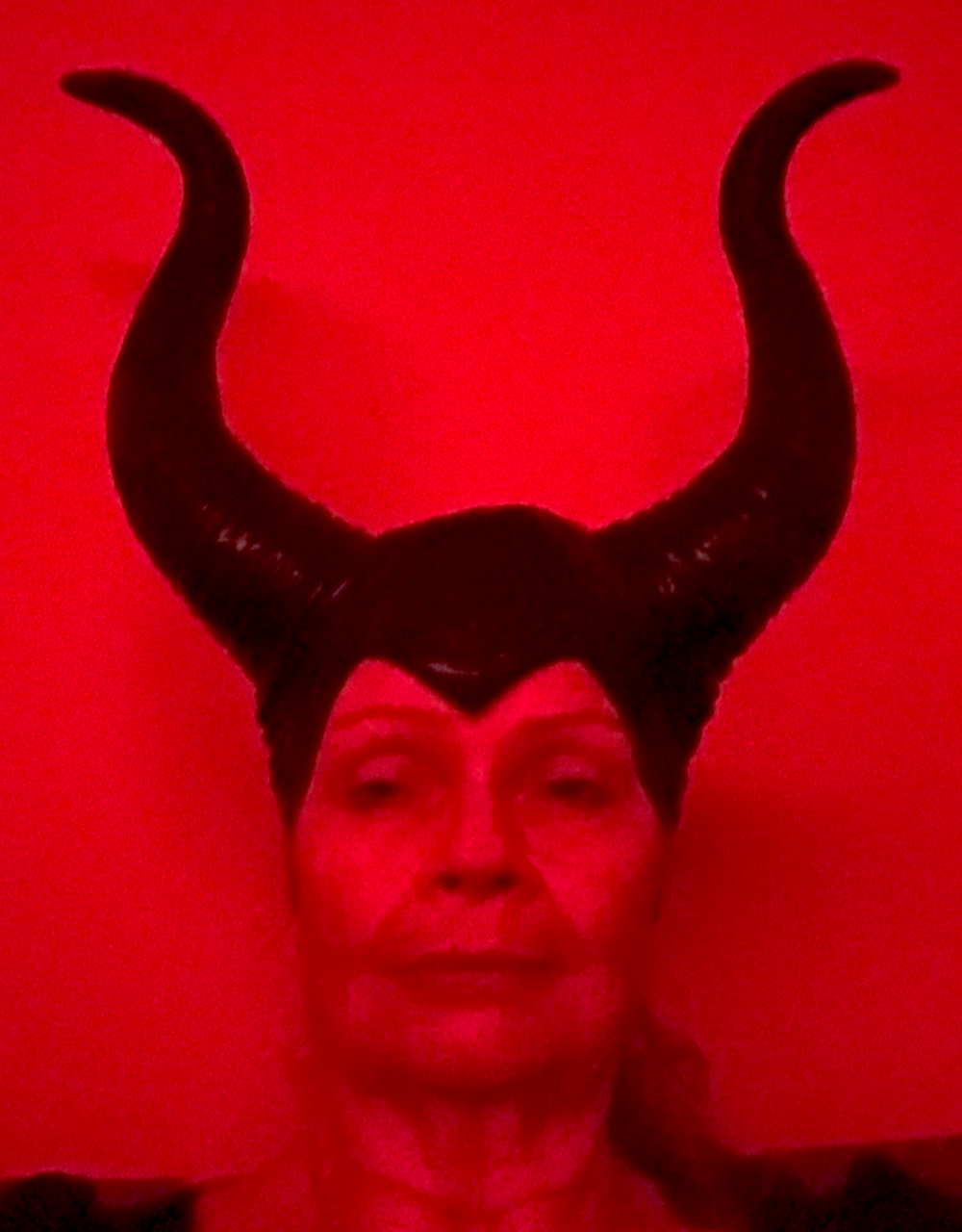 Maleficynt wearing her dramatic horned headdress